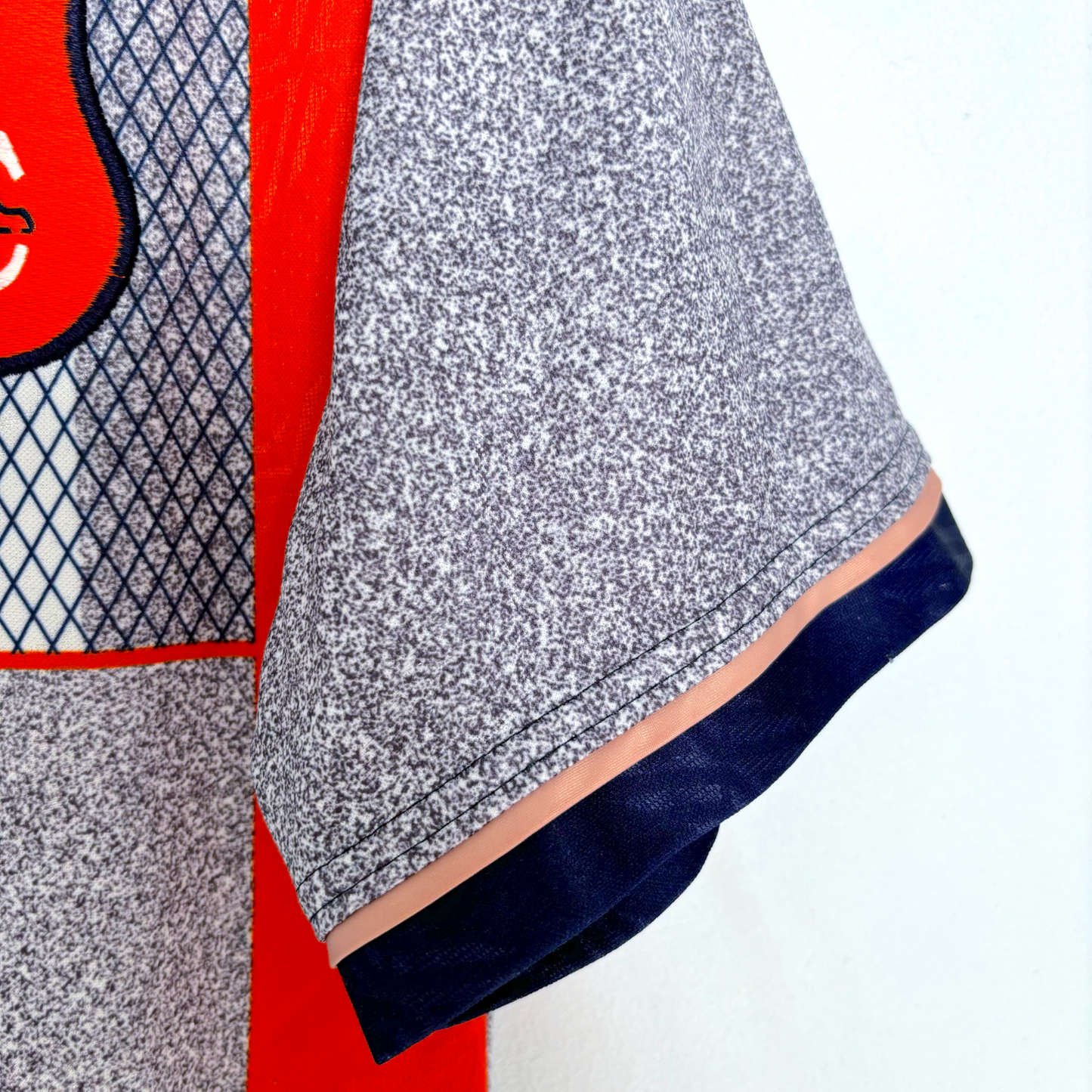 Close-up of grey textured sleeve with navy trim on vintage football shirt, classic retro soccer jersey detail. - Chelsea 1994/1995/1996 Away Football Shirt Umbro Jersey Coors