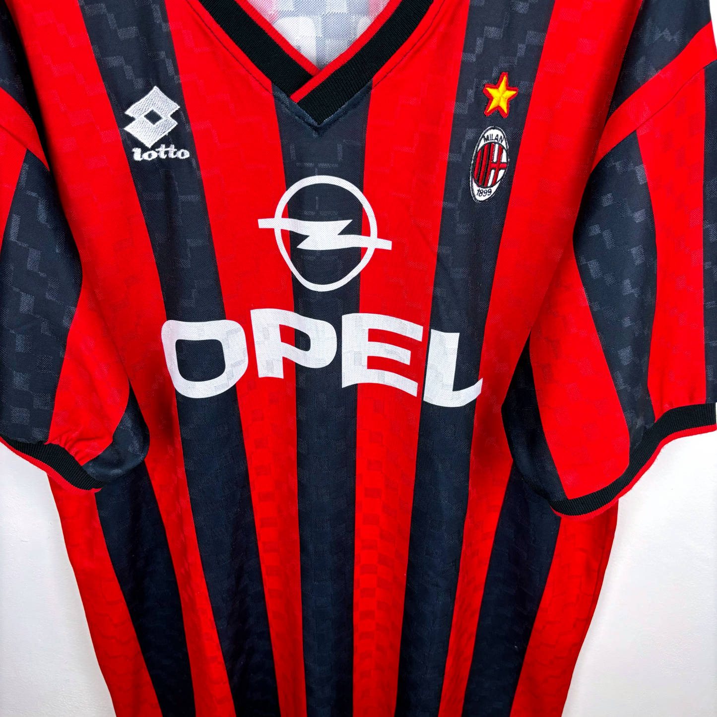 Vintage AC Milan home football shirt 1994-1996 with black and red stripes, Opel sponsor logo, and Lotto branding. - AC Milan 1994/1995/1996 Home Football Shirt Maglia Lotto - Maldini 3