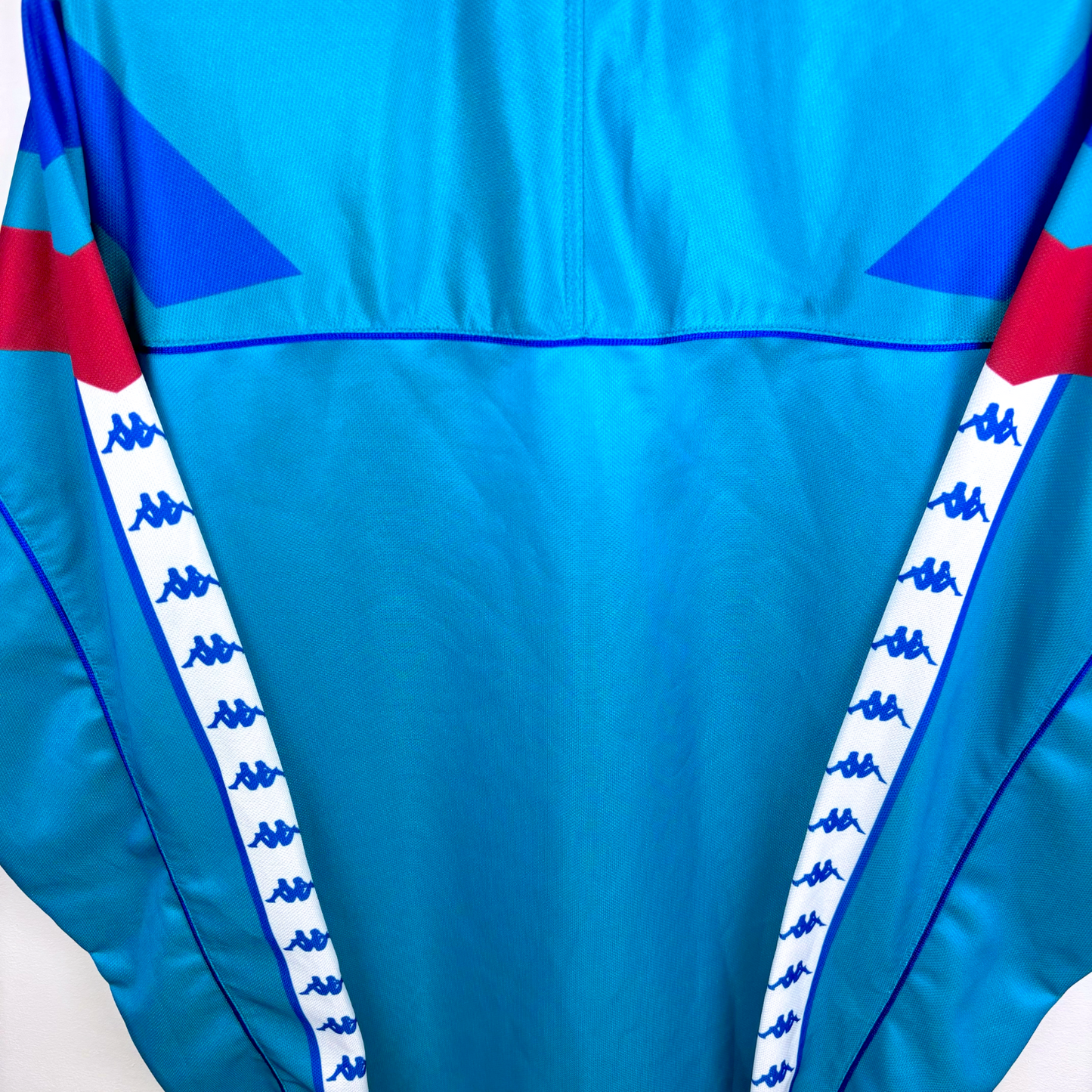 Vintage retro football shirt FC Barcelona blue Kappa longsleeve with red and white sleeve stripes, retro soccer jersey detail. - FC Barcelona 1992/1993/1994/1995 Away Football Shirt Kappa Longsleeve