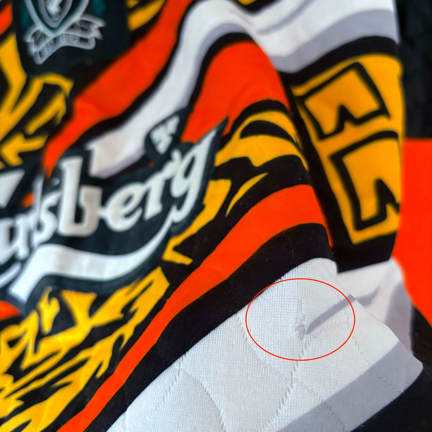 Liverpool FC 1995-1996 vintage retro football shirt with Carlsberg logo and bold orange, black, and yellow patterns, showing . - Liverpool FC 1995-1996 Goal Keeper Football Shirt Adidas