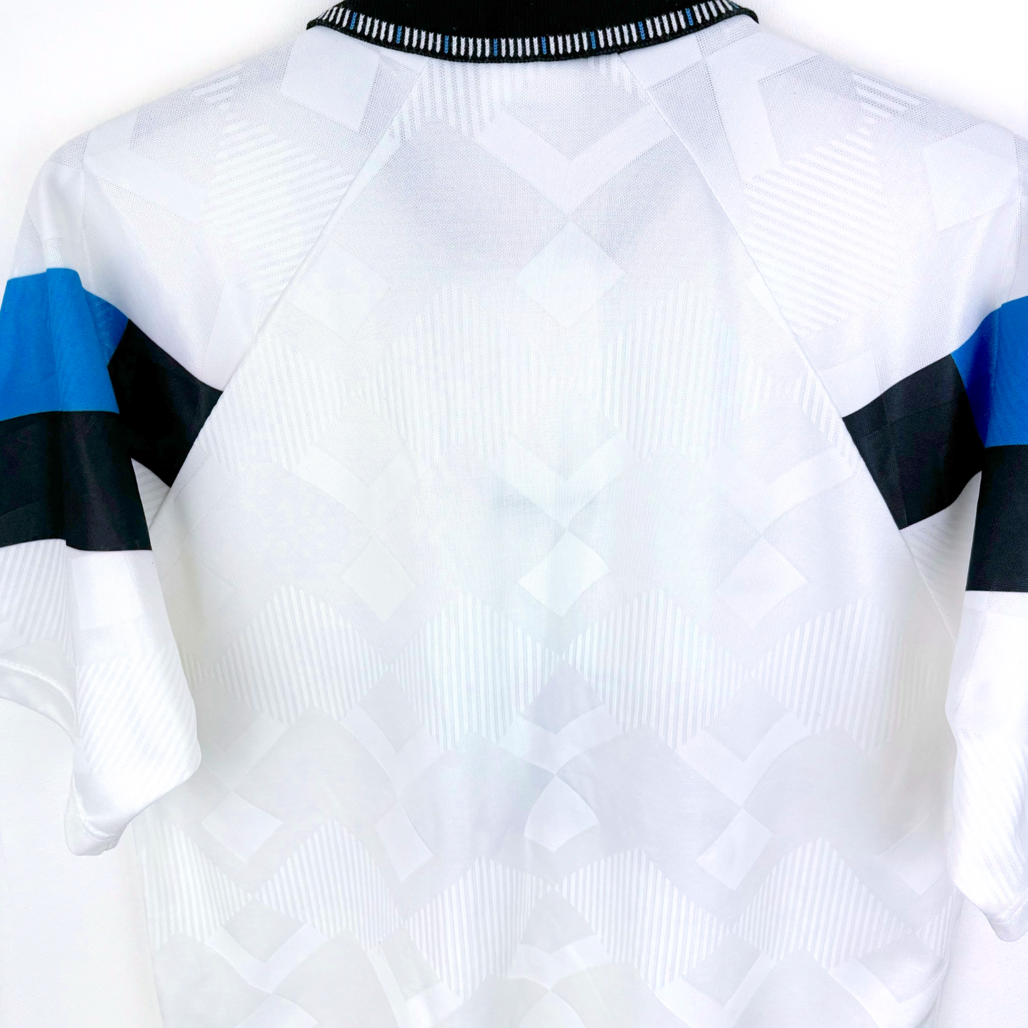 Aston Villa vintage football shirt white with black and blue sleeve stripes and subtle geometric pattern retro soccer jersey . - Aston Villa 1990/1991/1992/1993 Away Football Shirt Umbro