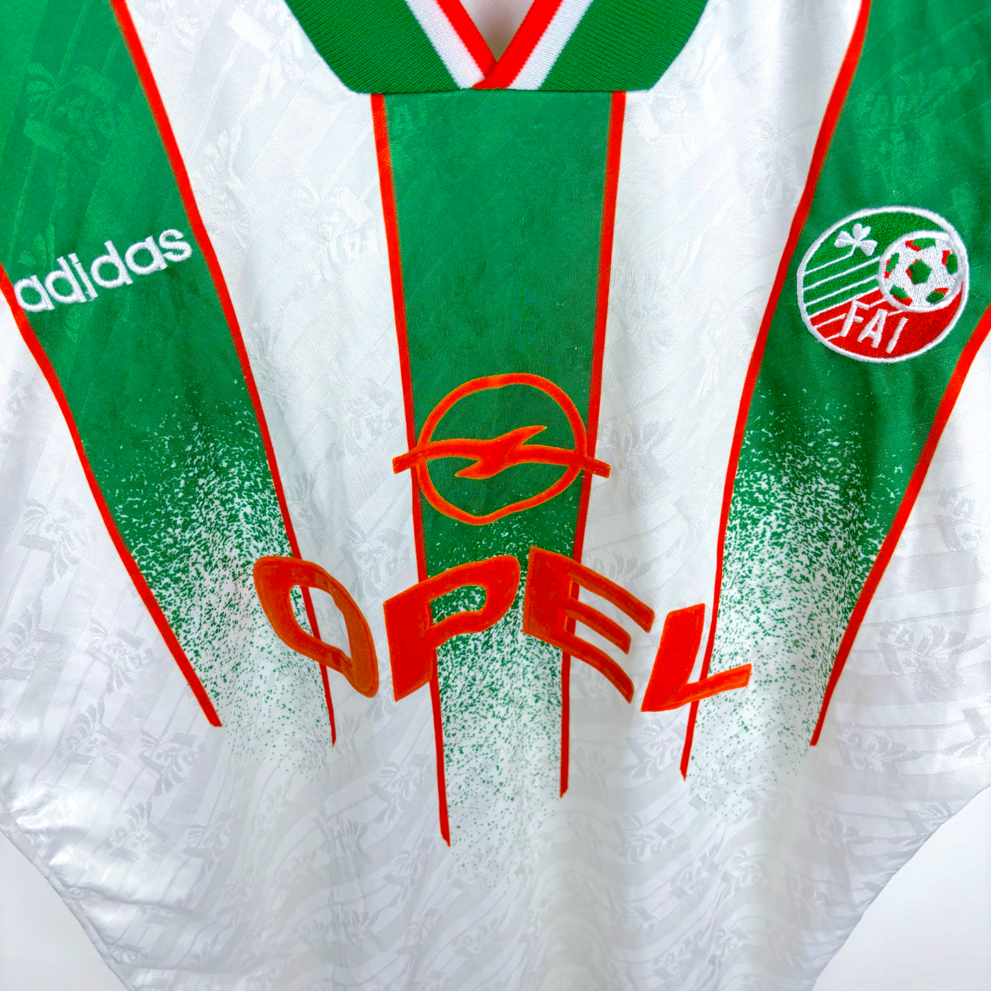 1994-1995 Eire Ireland USA World Cup vintage football shirt with green and red stripes and Adidas branding. - Eire Ireland 1994-1995 USA World Cup Away Football Shirt Adidas