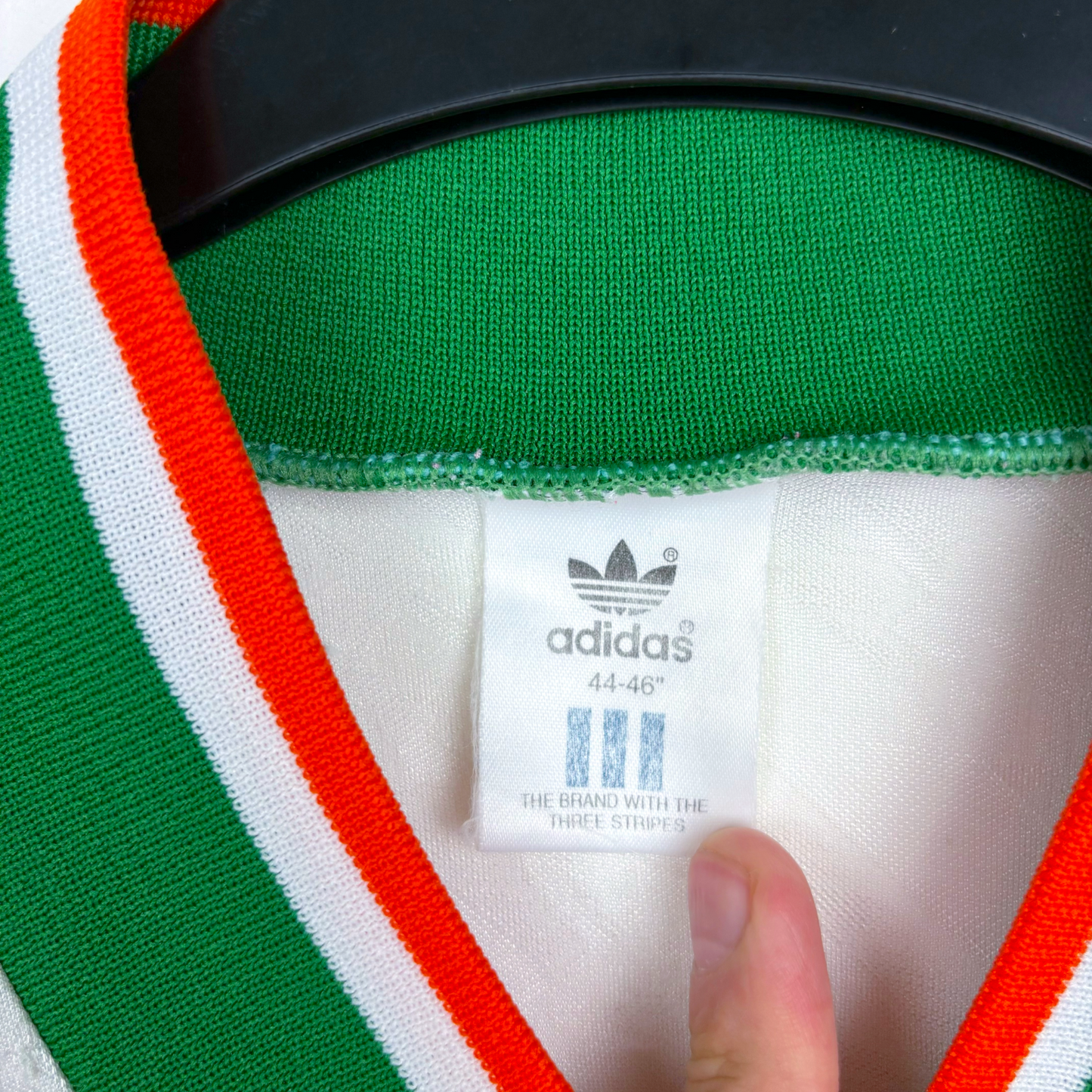 Green vintage football shirt collar with white, red, and orange trim and Adidas tag, size 44-46 vintage retro football shirt . - Eire Ireland 1994-1995 USA World Cup Away Football Shirt Adidas