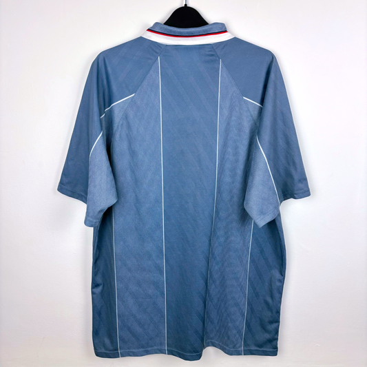 Rear view of an England vintage football shirt produced by Umbro.