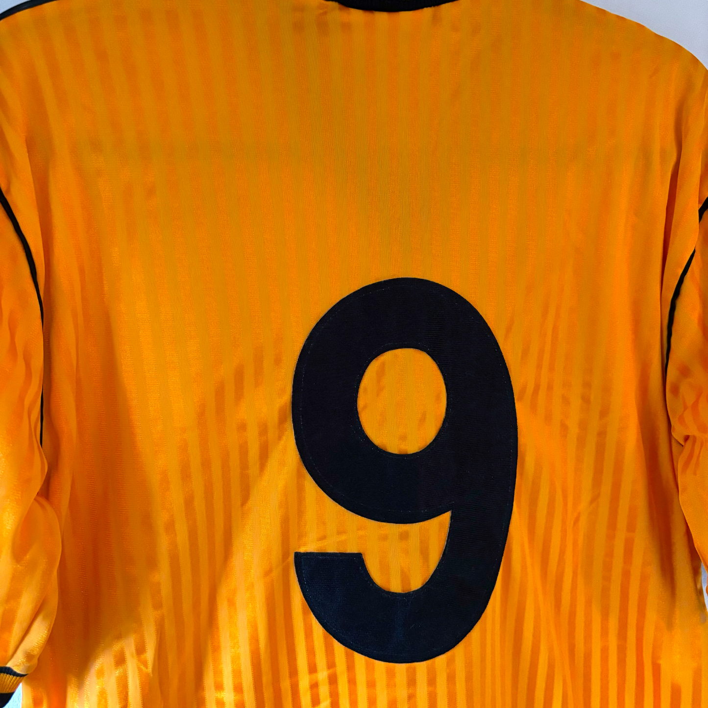 Wolverhampton Wanderers vintage football shirt in gold with black number 9, retro soccer jersey design. - Wolverhampton Wanderers 1988/1989/1990 Wolves Home Football Shirt Score
