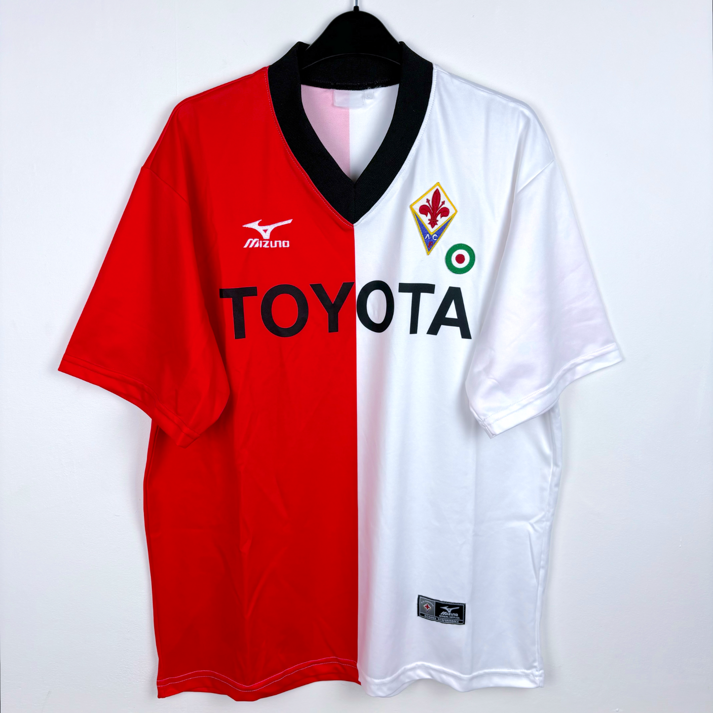 Fiorentina 2001-2002 vintage football shirt in red and white half-split design with black collar and Toyota sponsor logo. - Fiorentina 2001-2002 Third Football Shirt Mizuno Maglia Calcio