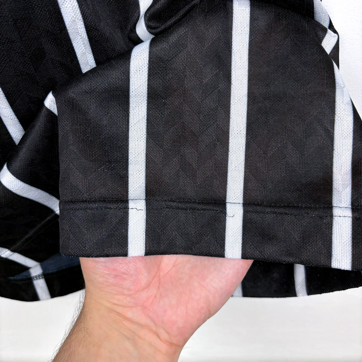 Black and white striped vintage football shirt sleeve with subtle chevron pattern, retro soccer jersey detail. - Corinthians 1992/1993/1994 Away Football Shirt Camisa Finta