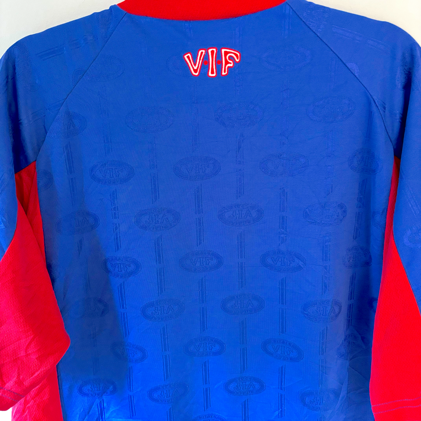Blue and red vintage football shirt with "VIF" logo and subtle adidas pattern, retro soccer jerseys style. - Valerenga VIF 1998-1999 Home Football Shirt Jersey Adidas
