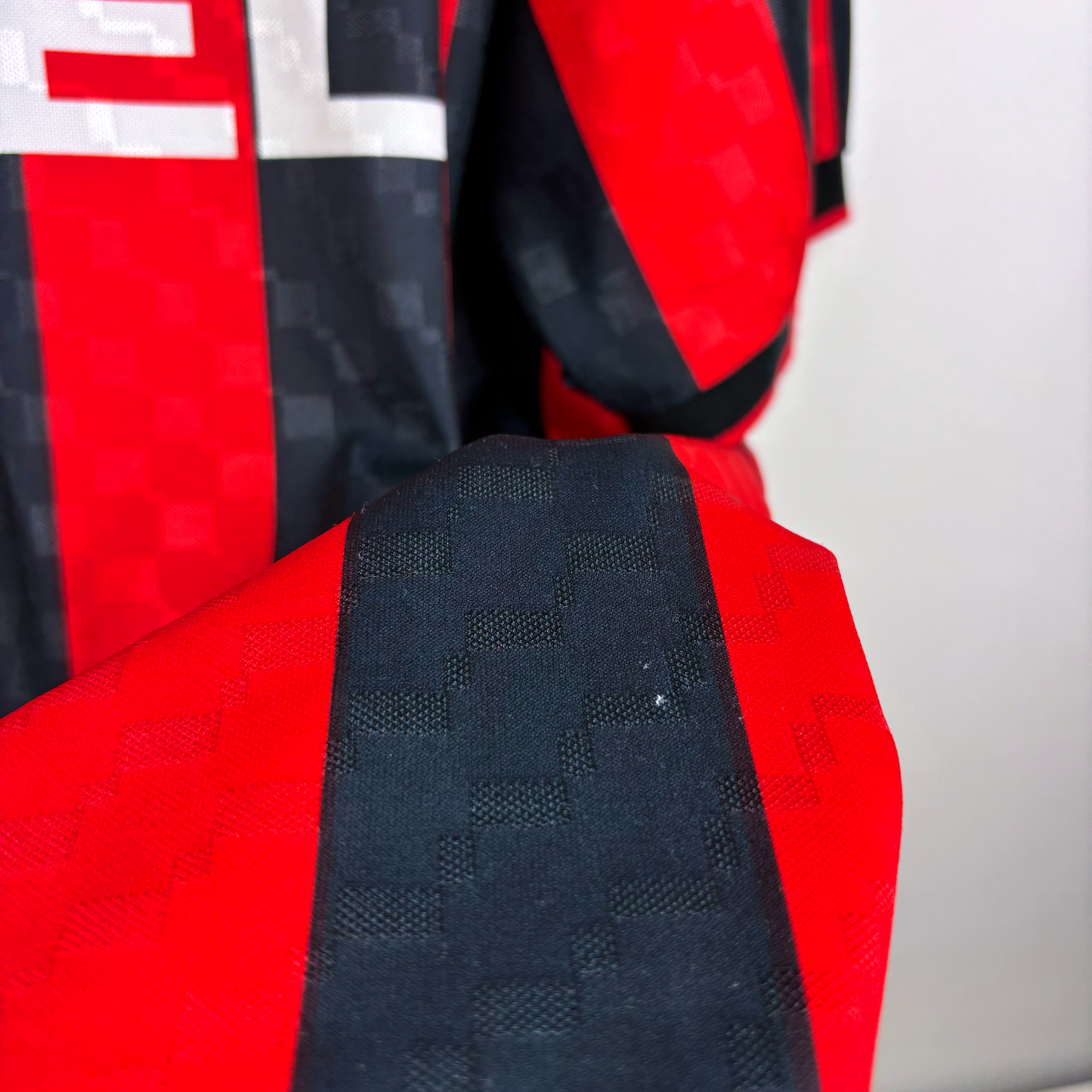 AC Milan vintage football shirt with red and black checkerboard pattern, classic retro soccer jersey design. - AC Milan 1994/1995/1996 Home Football Shirt Maglia Lotto - Maldini 3