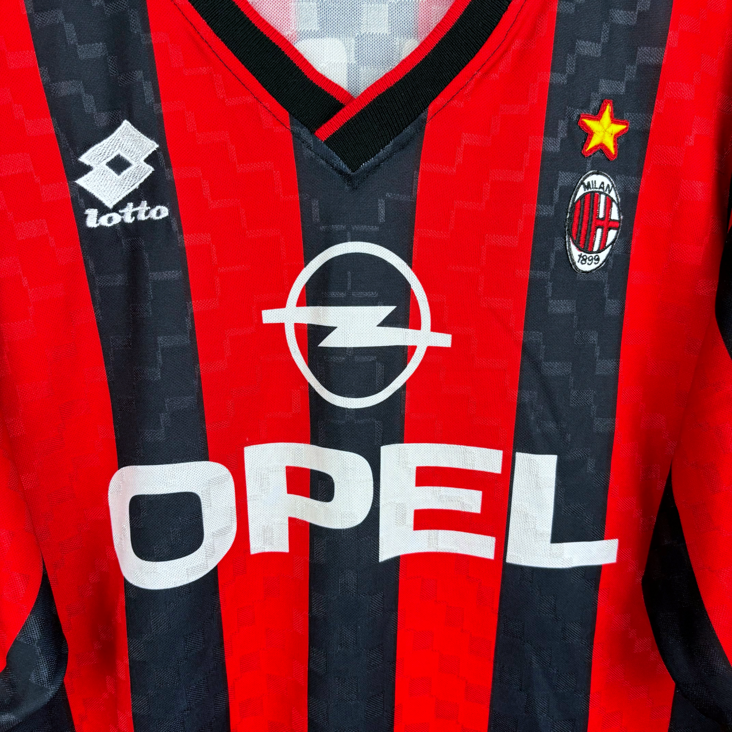 AC Milan vintage football shirt with red and black stripes, Lotto logo, Opel sponsor, and Maldini 3 details. - AC Milan 1994/1995/1996 Home Football Shirt Maglia Lotto - Maldini 3