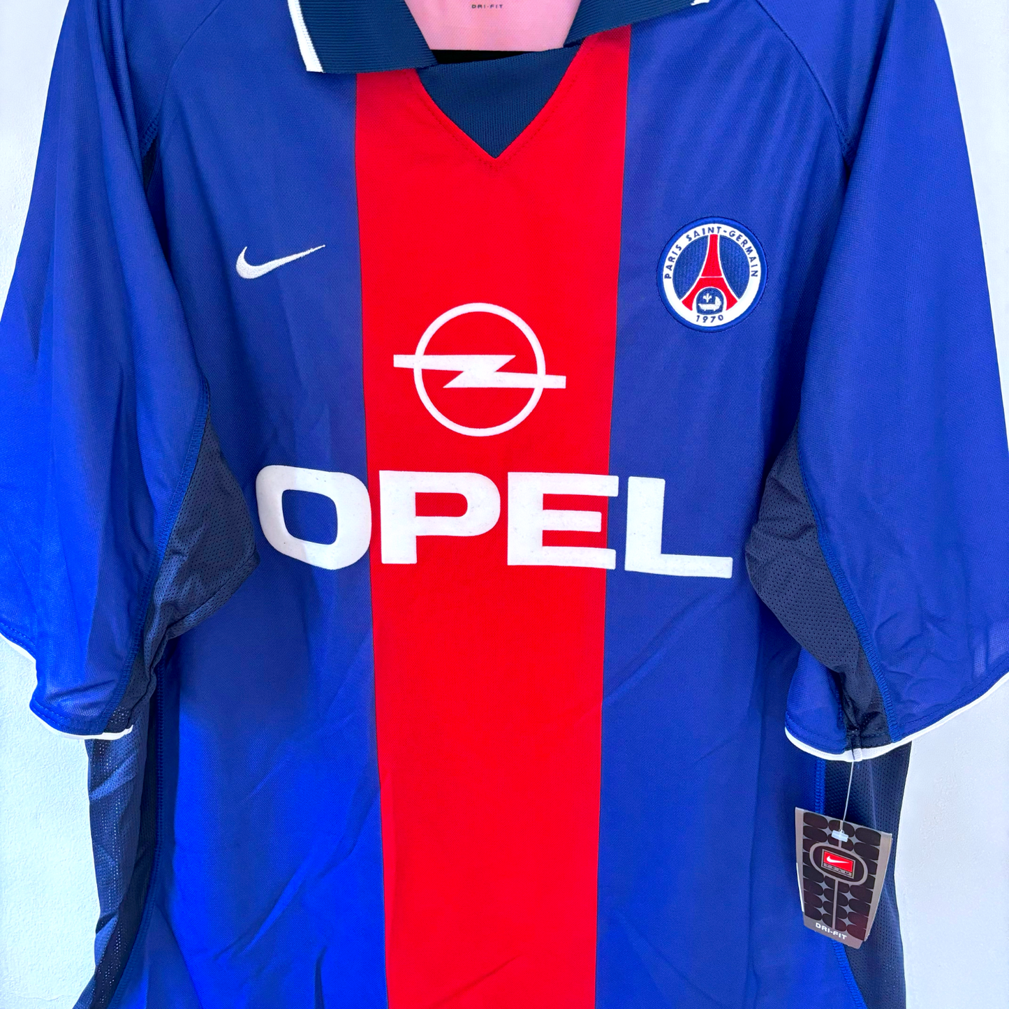 Blue and red vintage football shirt with PSG crest, Nike logo, Opel sponsor, retro football shirts style. - BWNT Paris Saint Germain PSG 1999-2000 Home Football Shirt Maillot Nike
