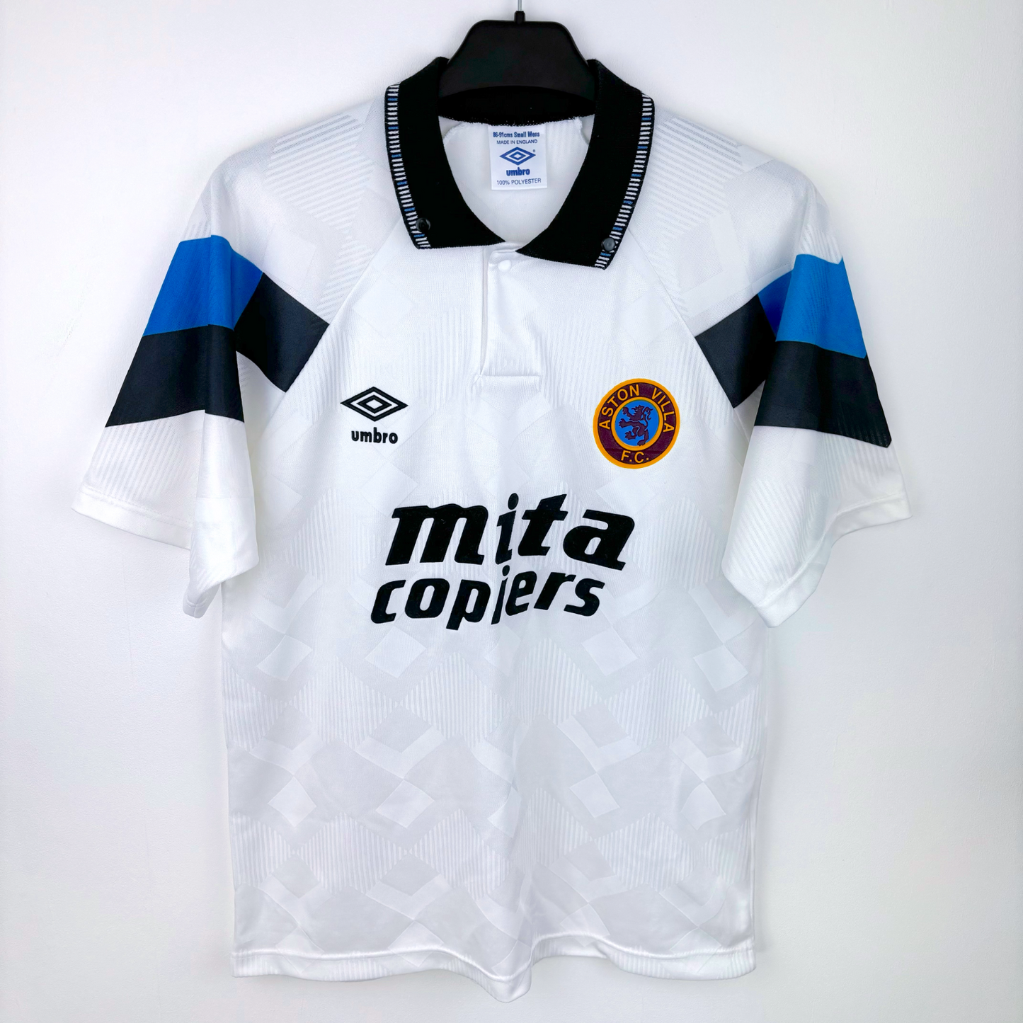 Aston Villa vintage football shirt with white base, black and blue horizontal sleeve stripes, Umbro logo, and Mita Copiers. - Aston Villa 1990/1991/1992/1993 Away Football Shirt Umbro