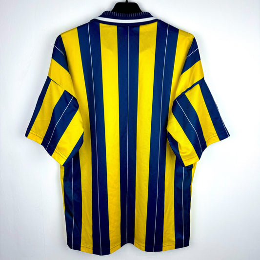 Torquay United 1995 home shirt by Le Coq Sportif – navy and yellow striped vintage football kit from the reverse