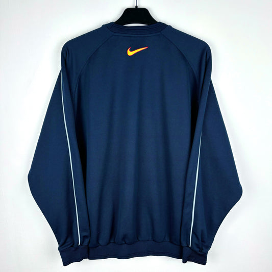 Rear view of Barcelona 2000-2001 retro Nike training sweatshirt. Navy body with central Nike swoosh below neck. White sleeve piping.