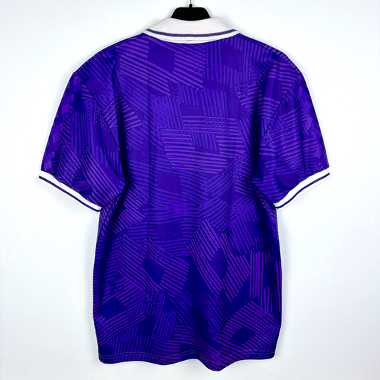 Rear view of Fiorentina 1991-1992 home vintage football shirt produced by Lotto. Purple body spanned by Lotto logo pattern and white collar.