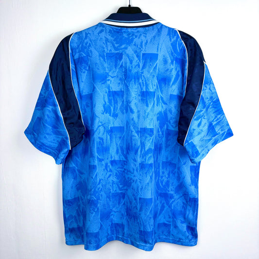 Rear view of Hartlepool United 1993-1995 vintage football shirt with 'Strongarm' sponsor. Blue body with navy trim and collar.