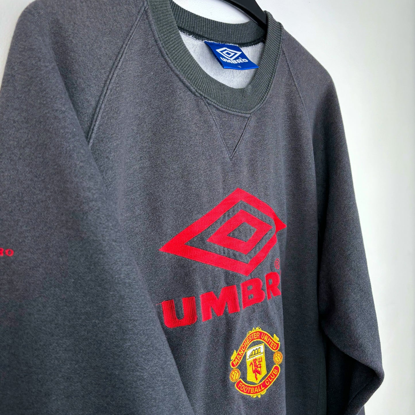 Side view of 1992-1994 Manchester United grey Umbro sweatshirt – classic old football shirt.