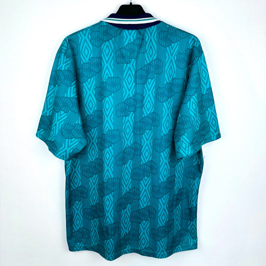 Rear view of Sheffield United 1994-1995 away classic football shirt made by Umbro. Sublimated Umbro pattern in teal/emerald with navy collar