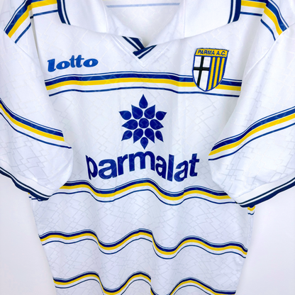 Angled close up of retro football shirt by Parma AC produced by Lotto. White body featuring blue and yellow hoops.