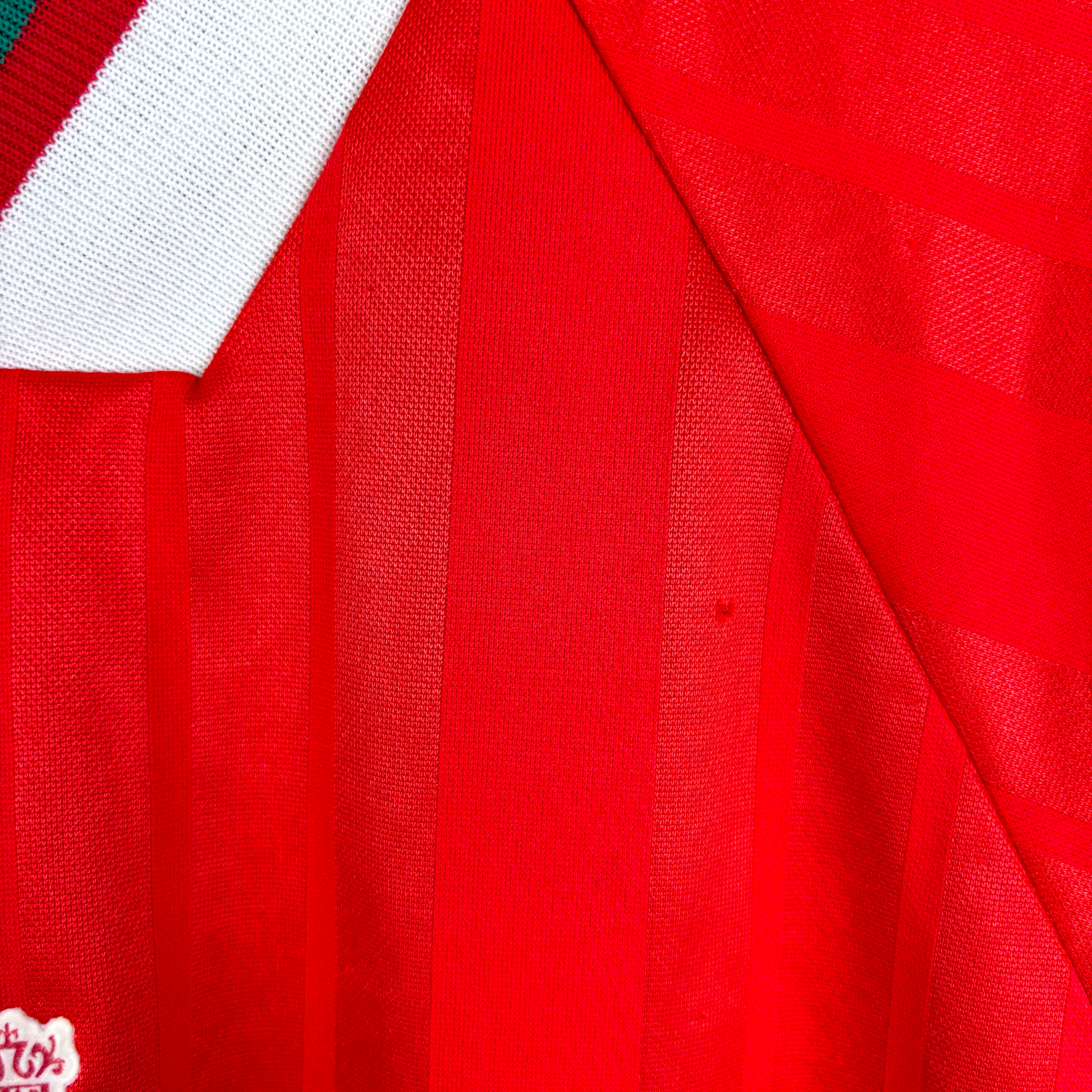 Liverpool FC vintage football shirt in red with subtle vertical stripes and white collar, retro football classics shirt. - Liverpool FC 1993/1994/1995 Home Football Shirt Adidas