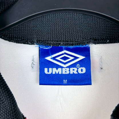 Blue Umbro tag on black and white vintage retro football shirt collar in medium size. - Manchester United 1997/1998/1999 Away Umbro Football Shirt Long Sleeve
