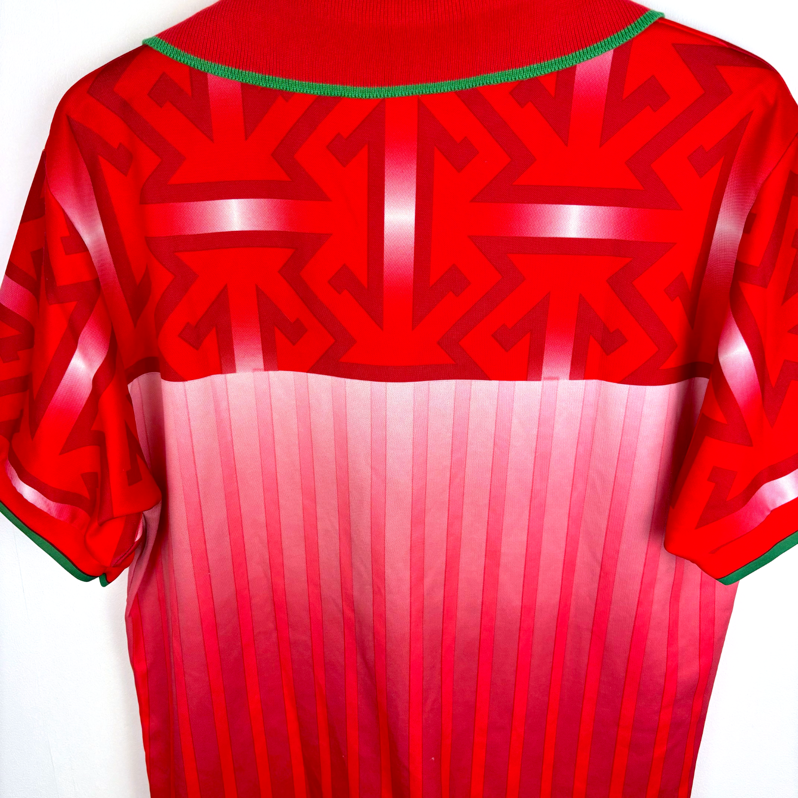 Vintage retro football shirt with red geometric pattern and gradient pink stripes, classic Lotto design. - Morocco 1994/1995/1996 Home Football Shirt Maglia Calcio Lotto