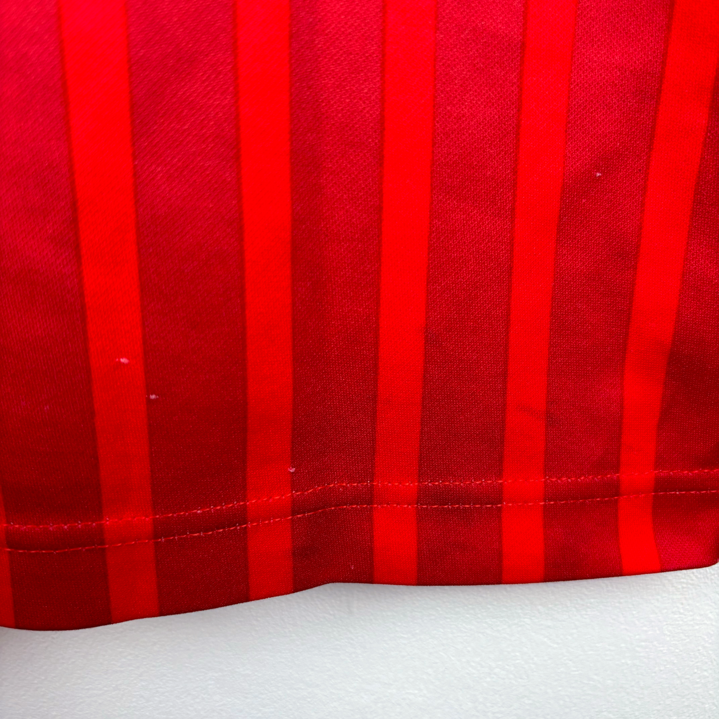 Red striped vintage football shirt fabric close-up from Morocco 1994-1996 home kit, retro soccer jersey detail. - Morocco 1994/1995/1996 Home Football Shirt Maglia Calcio Lotto