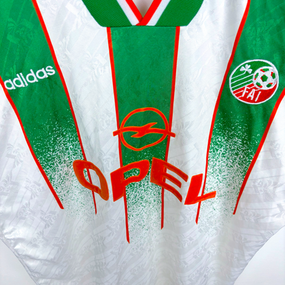 1994-1995 Eire Ireland USA World Cup vintage football shirt with green and red stripes and Adidas branding. - Eire Ireland 1994-1995 USA World Cup Away Football Shirt Adidas