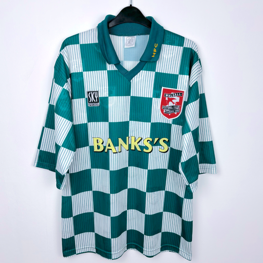 Walsall classic football shirt made by Sky Leisure. Check green and off-white pattern with Banks's yellow sponsor.