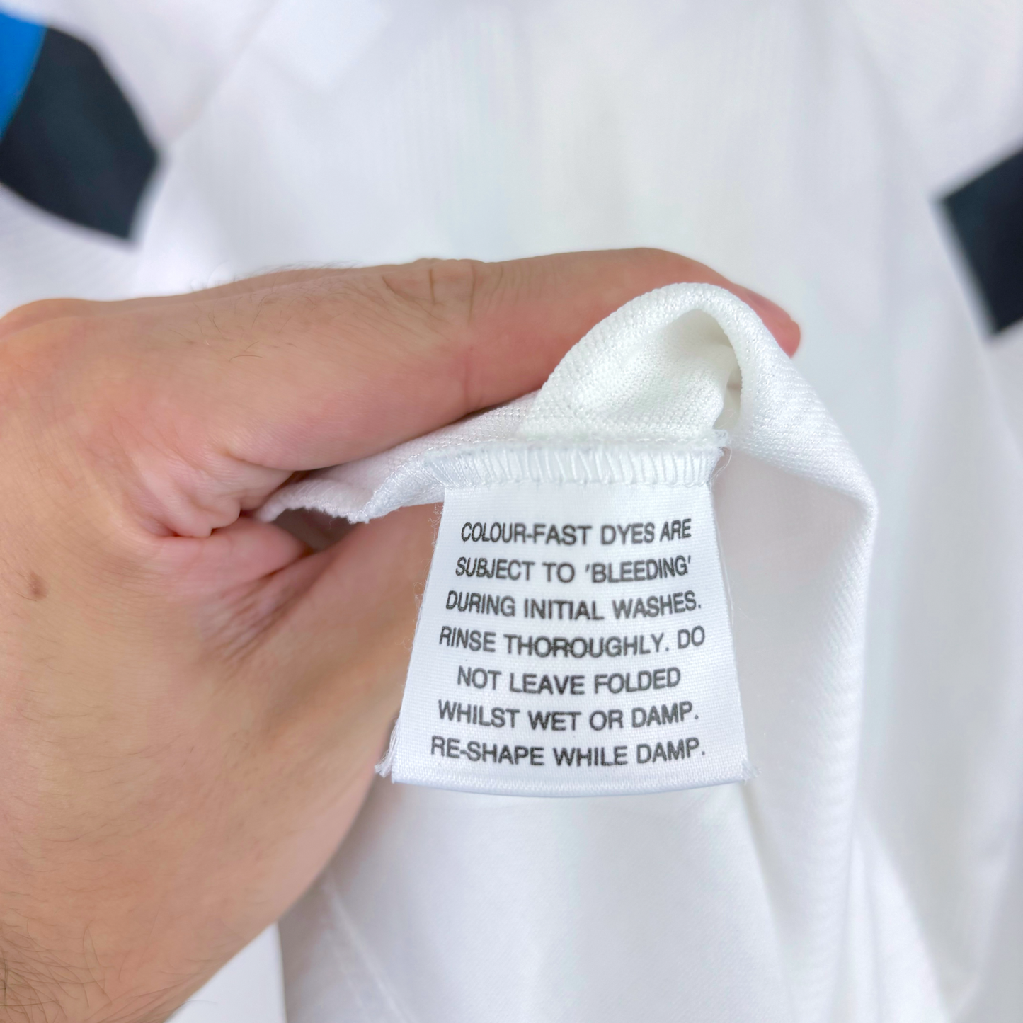 White vintage football shirt label with washing instructions for old football shirts and retro soccer jerseys. - Aston Villa 1990/1991/1992/1993 Away Football Shirt Umbro