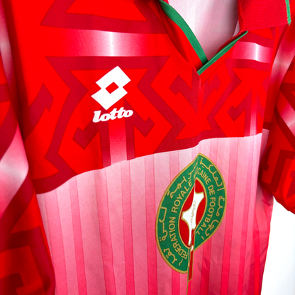 Red and pink Morocco 1994 vintage football shirt with Lotto logo and national crest, retro soccer jersey details. - Morocco 1994/1995/1996 Home Football Shirt Maglia Calcio Lotto