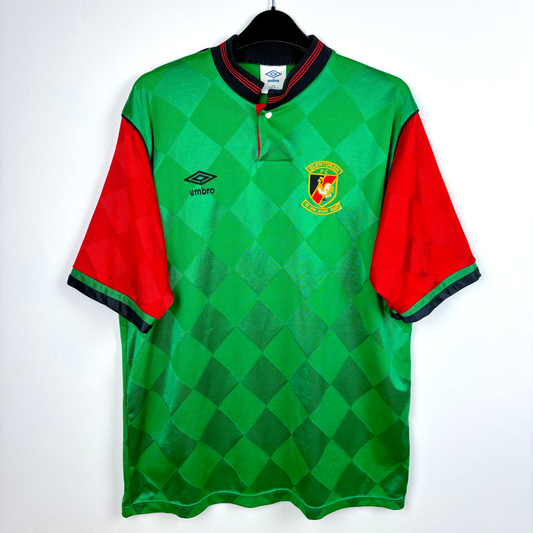 Glentoran classic football shirt produced by Umbro. Green body featuring red sleeves and grandad collar.