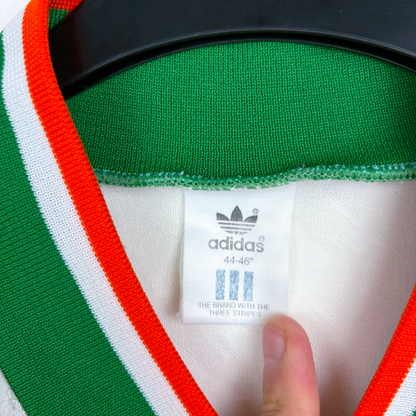 Green vintage football shirt collar with white, red, and orange trim and Adidas tag, size 44-46 vintage retro football shirt . - Eire Ireland 1994-1995 USA World Cup Away Football Shirt Adidas