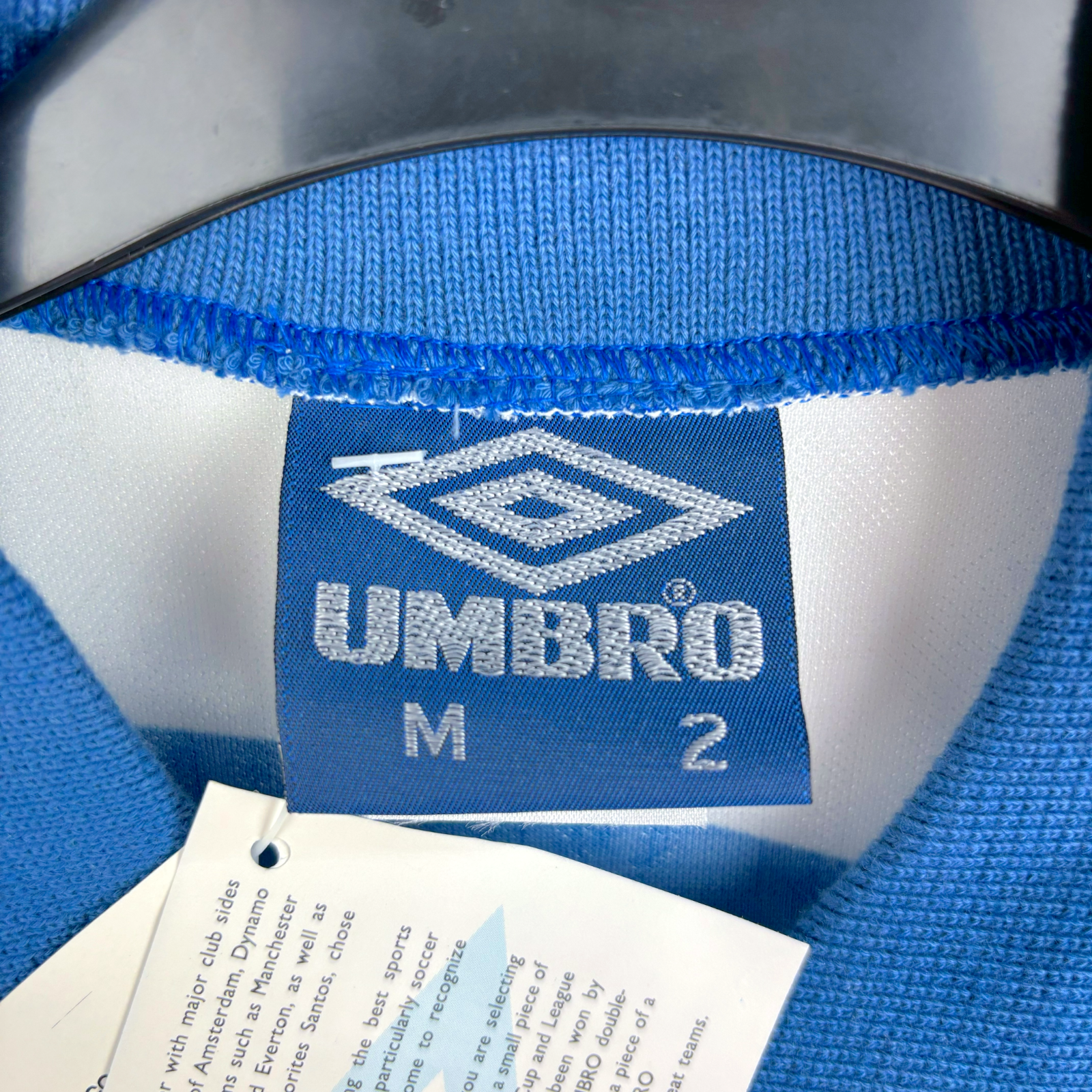 UMBRO blue collar tag on vintage football shirt labeled size M with original care tags attached. - BNWT Velez Sarsfield 1993/1994/1995 Home Football Shirt Camisa Umbro