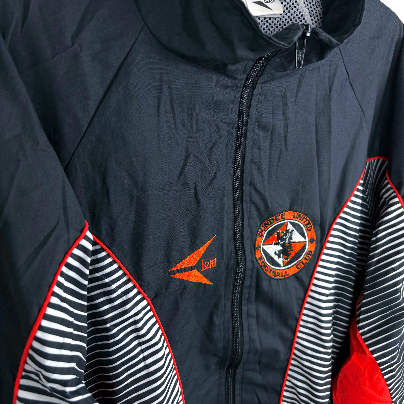 Dundee United vintage football shirt training jacket with black, white striped panels and orange detailing. - Dundee United 1992/1993/1994 Loki Training Jacket Zip Track Tracksuit