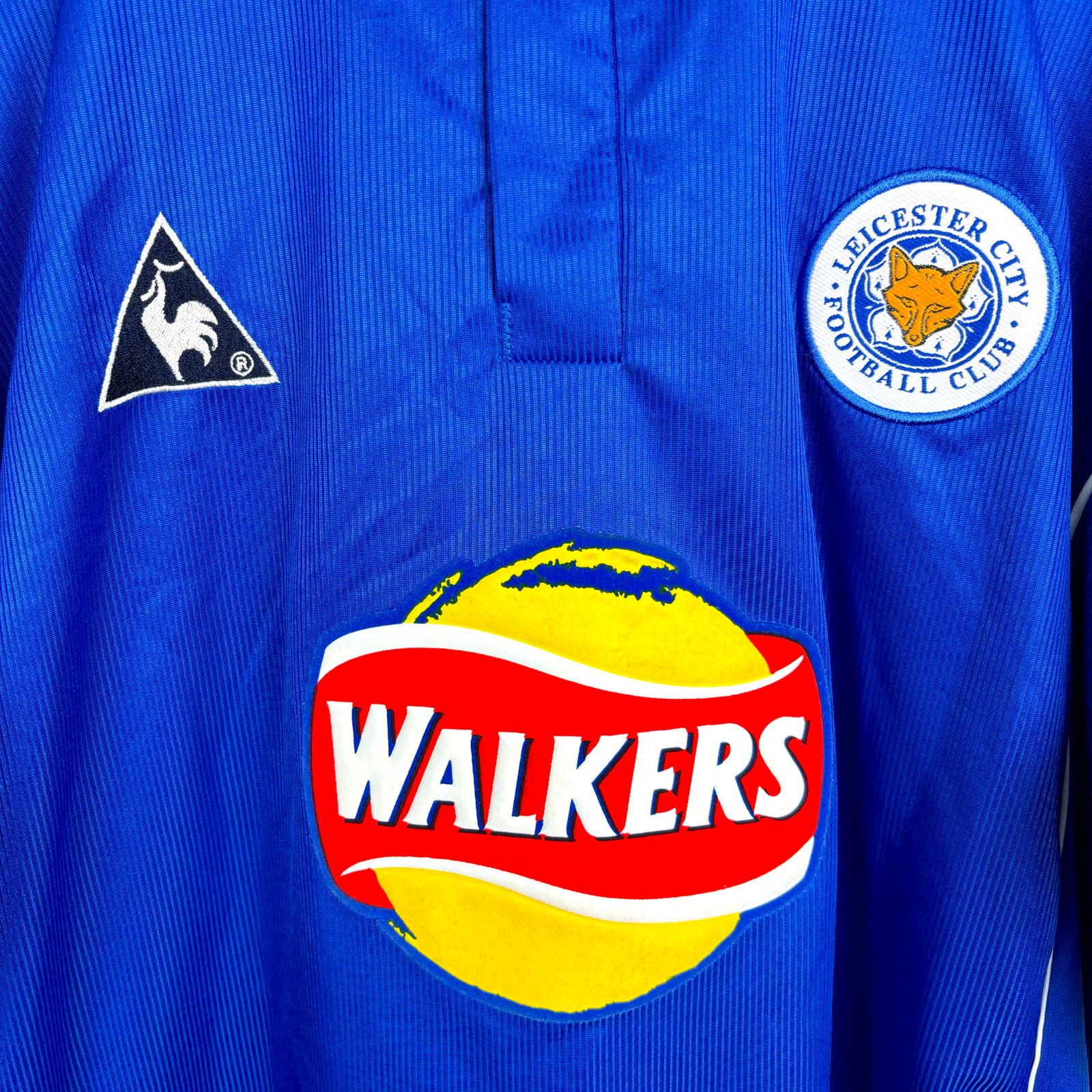 Blue vintage retro football shirt with Leicester City badge, Le Coq Sportif logo, and Walkers sponsor logo. - MINT Leicester City 2000-2001 Home Football Shirt Le Coq Sportif