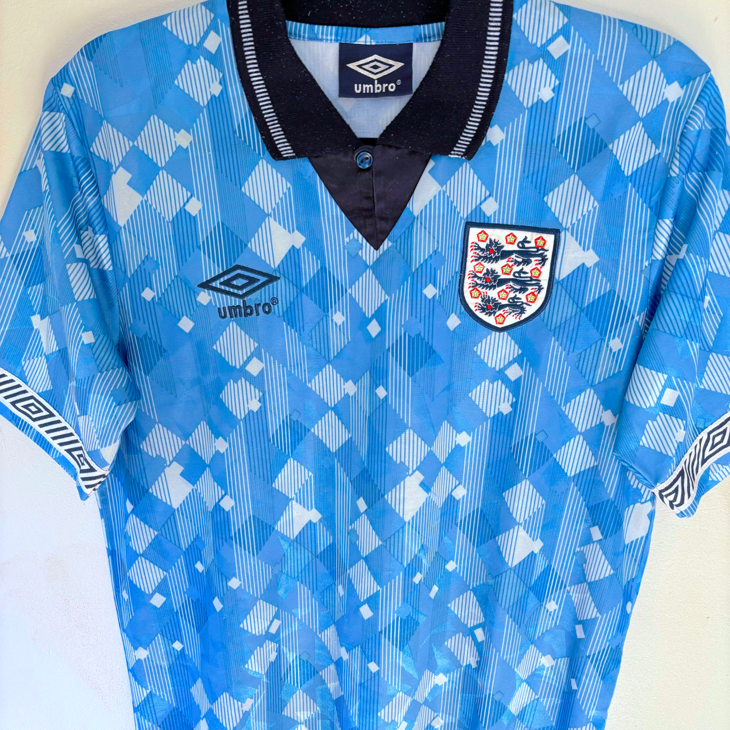 England 1990-1992 vintage football shirt in blue with Umbro logo and England crest, classic retro design. - England 1990/1991/1992 Third 3rd Blue Umbro Football Shirt Reissue