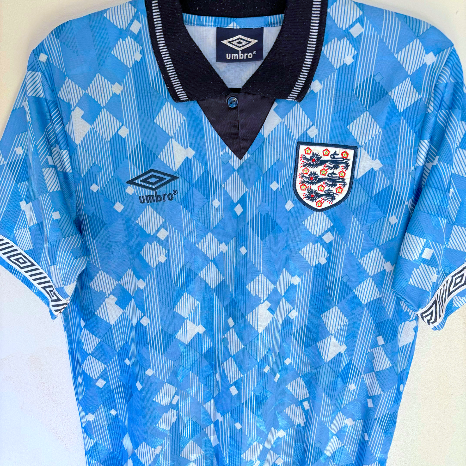 England 1990-1992 vintage football shirt in blue with Umbro logo and England crest, classic retro design. - England 1990/1991/1992 Third 3rd Blue Umbro Football Shirt Reissue