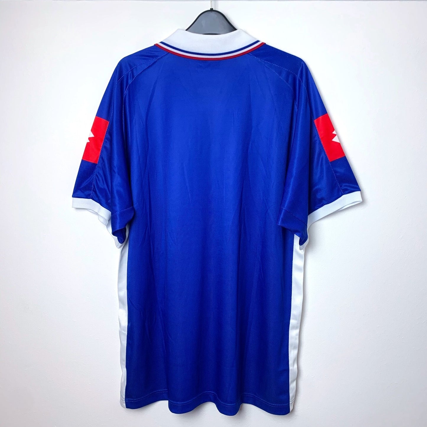Vintage 2002 blue Yugoslavia shirt by Lotto with red and white accents, back view