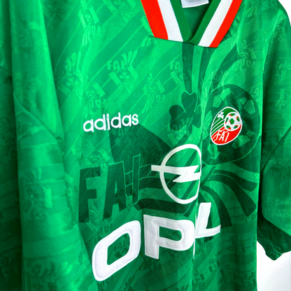 Green vintage football shirt with red and white collar, Adidas logo, and Austria badge, 1994-1995 retro soccer jersey design. - Eire Ireland 1994-1995 USA World Cup Home Football Shirt Adidas