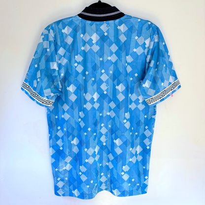 England 1990-1992 third blue Umbro vintage football shirt with geometric pattern and black collar. - England 1990/1991/1992 Third 3rd Blue Umbro Football Shirt Reissue