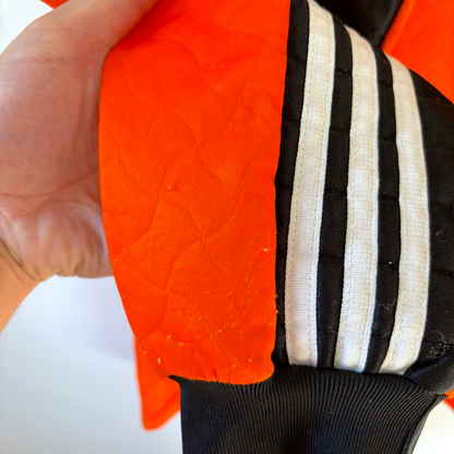 Orange and black Liverpool FC vintage football shirt sleeve with white Adidas stripes and quilted fabric detail vintage. - Liverpool FC 1995-1996 Goal Keeper Football Shirt Adidas