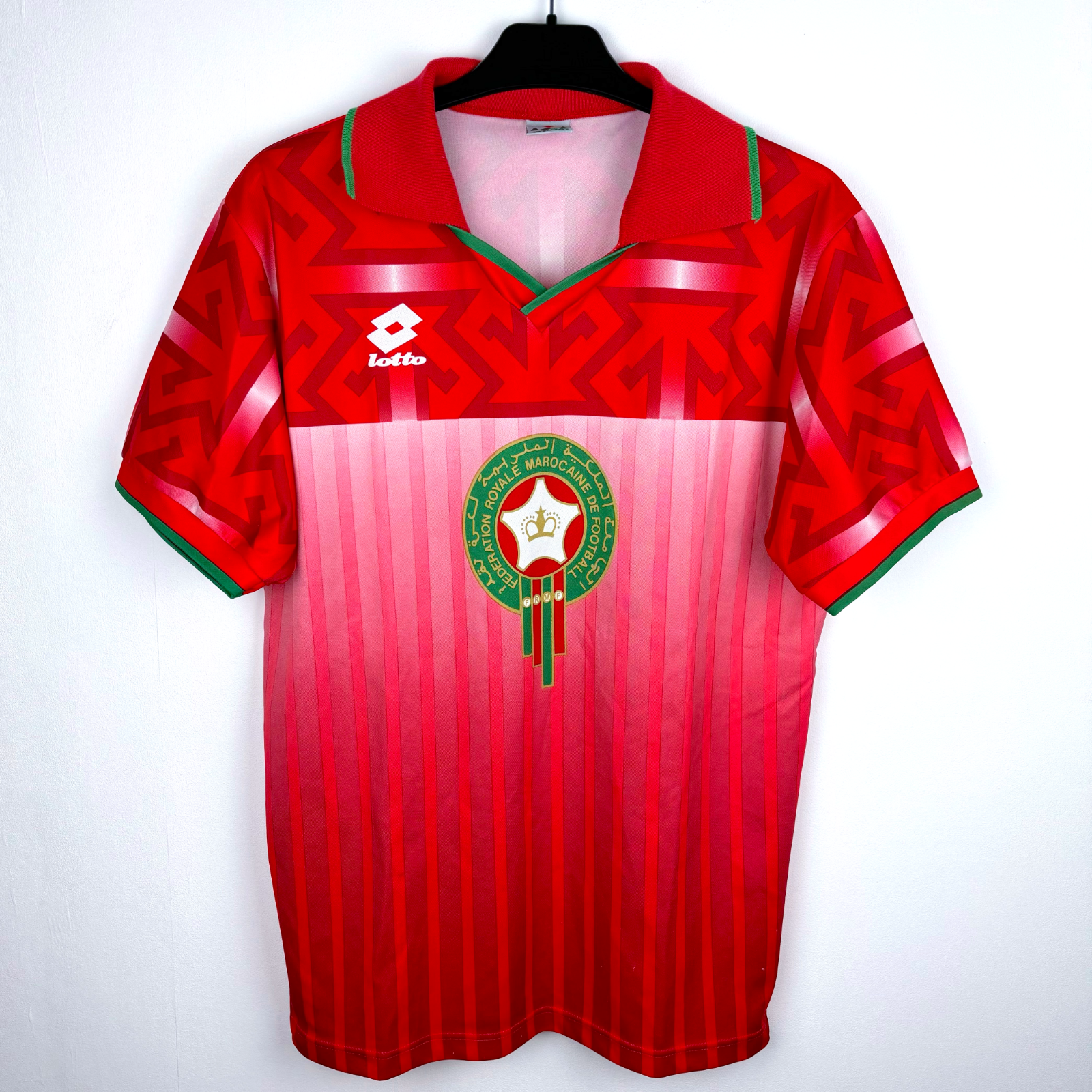 Morocco 1994 vintage football shirt in red with geometric patterns, green trim, and Lotto logo retro soccer jersey. - Morocco 1994/1995/1996 Home Football Shirt Maglia Calcio Lotto