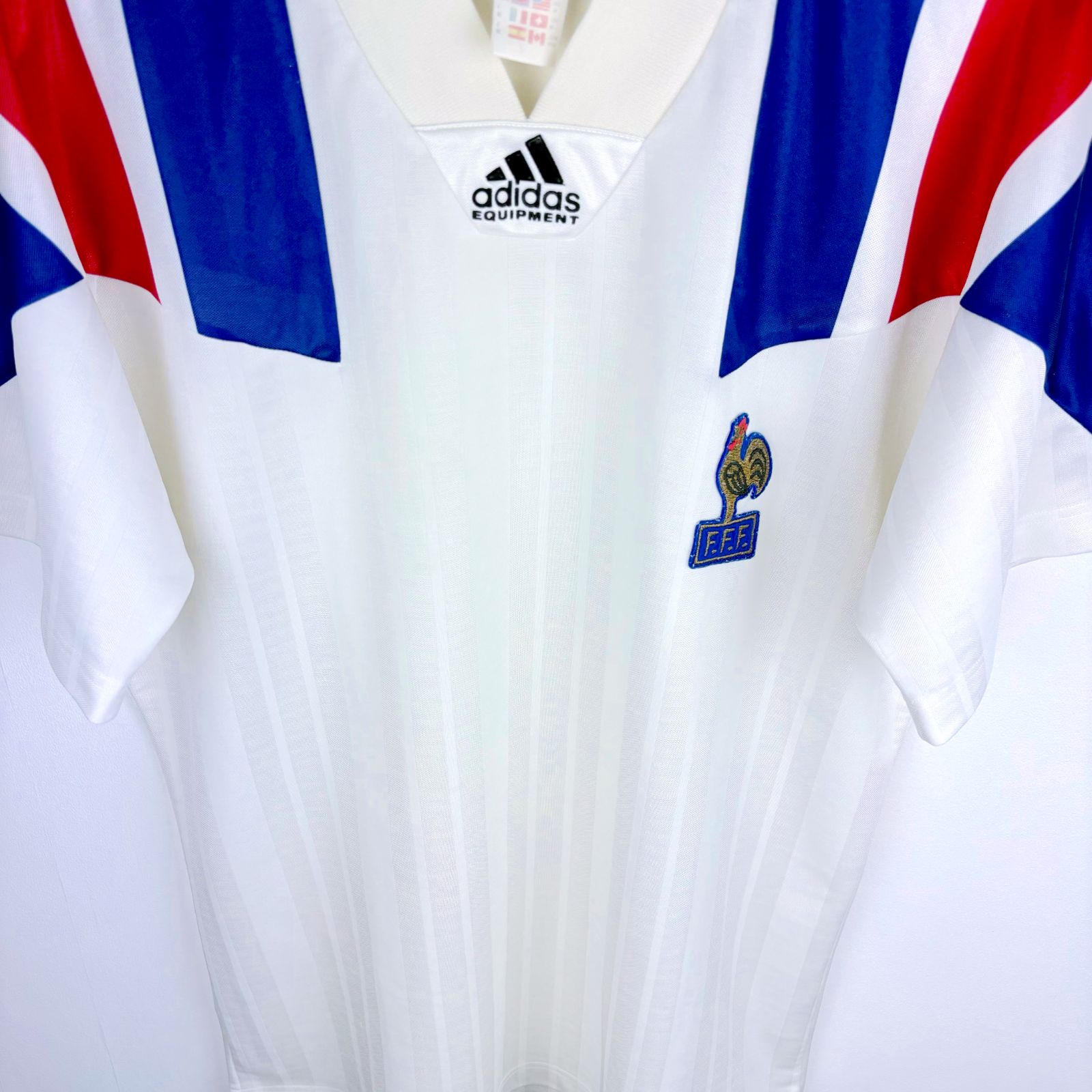 White vintage football shirt with blue and red shoulder accents, Adidas logo, and FFF crest. - Équipe de France FFF 1992/1993/1994 Away Football Maillot Shirt Adidas