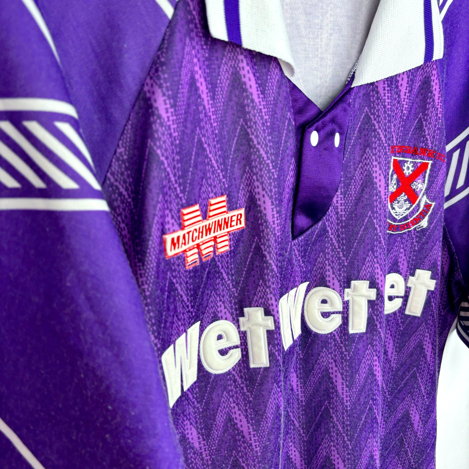 Purple vintage football shirt with white Wet Wet Wet sponsor logo and Clydebank FC crest, 1990s retro soccer jersey design. - Clydebank FC Wet Wet Wet 1993/1994/1995 Away Football Shirt Matchwinner