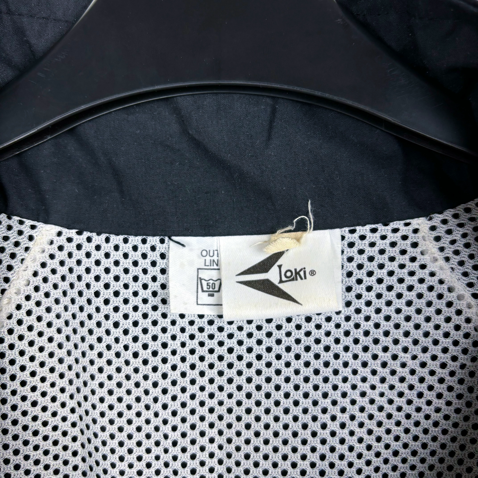 Black and white mesh lining detail with Loki brand tag on vintage football shirt collar. - Dundee United 1992/1993/1994 Loki Training Jacket Zip Track Tracksuit
