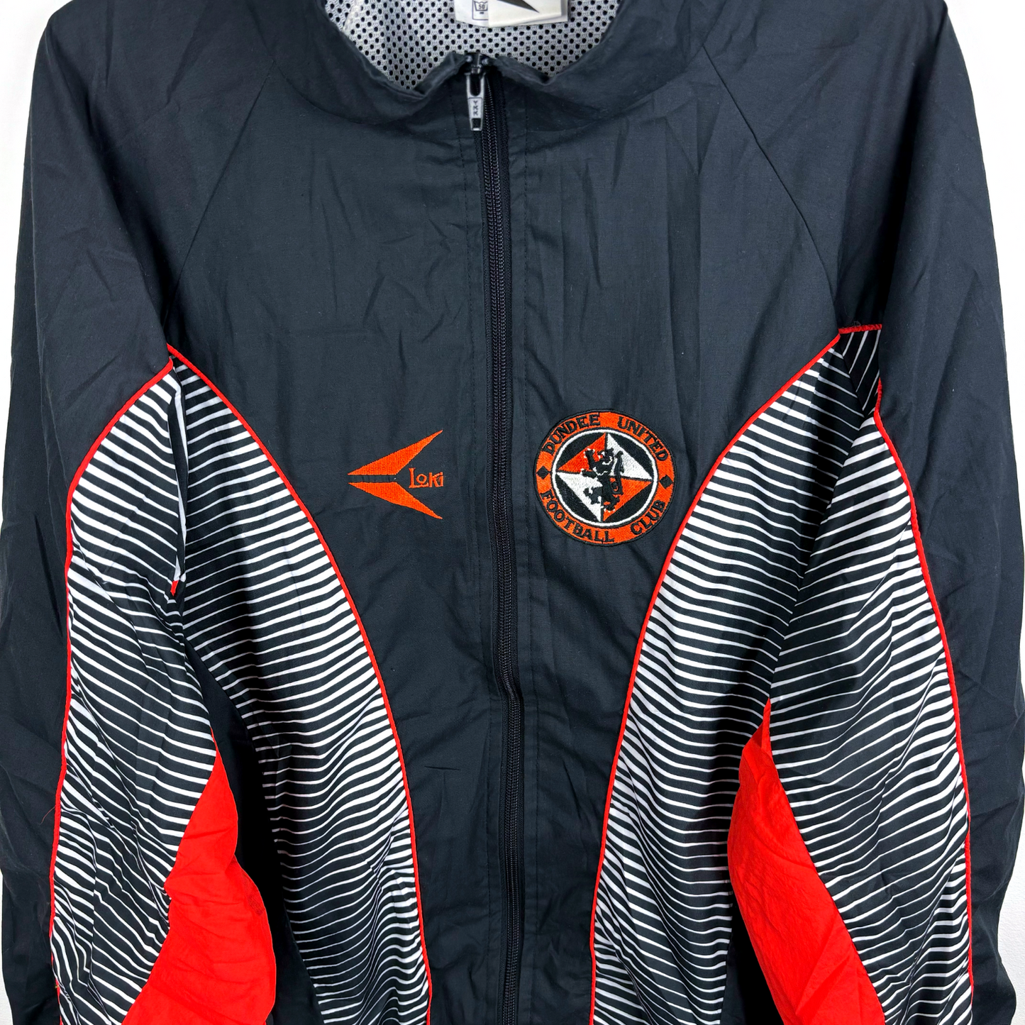 Dundee United vintage football shirt with black zip, orange and white striped panels, and club crest on chest. - Dundee United 1992/1993/1994 Loki Training Jacket Zip Track Tracksuit