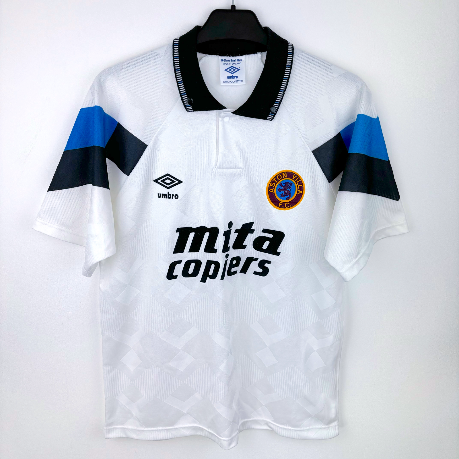 Aston Villa vintage football shirt with white base, black and blue horizontal sleeve stripes, Umbro logo, and Mita Copiers. - Aston Villa 1990/1991/1992/1993 Away Football Shirt Umbro