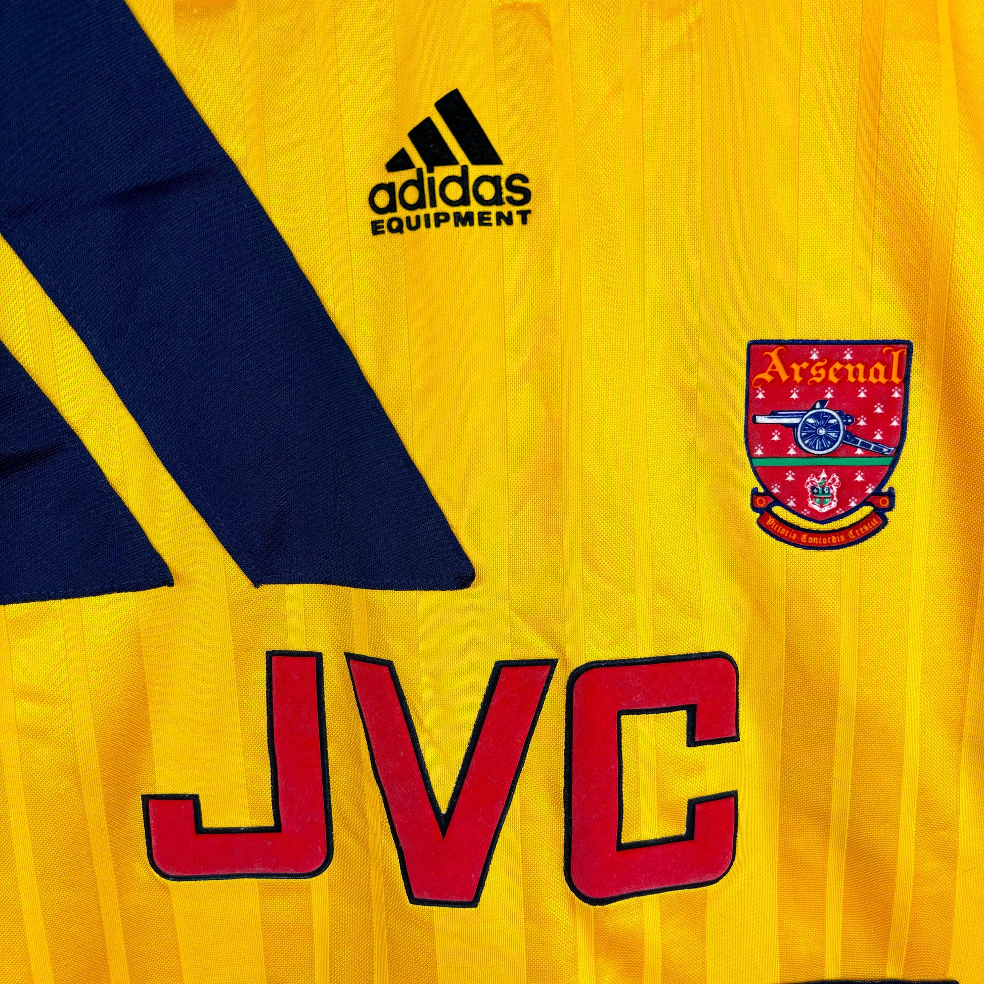 Close-up of Arsenal 1993-1994 Away Shirt sponsor and badges – vintage Adidas football shirt