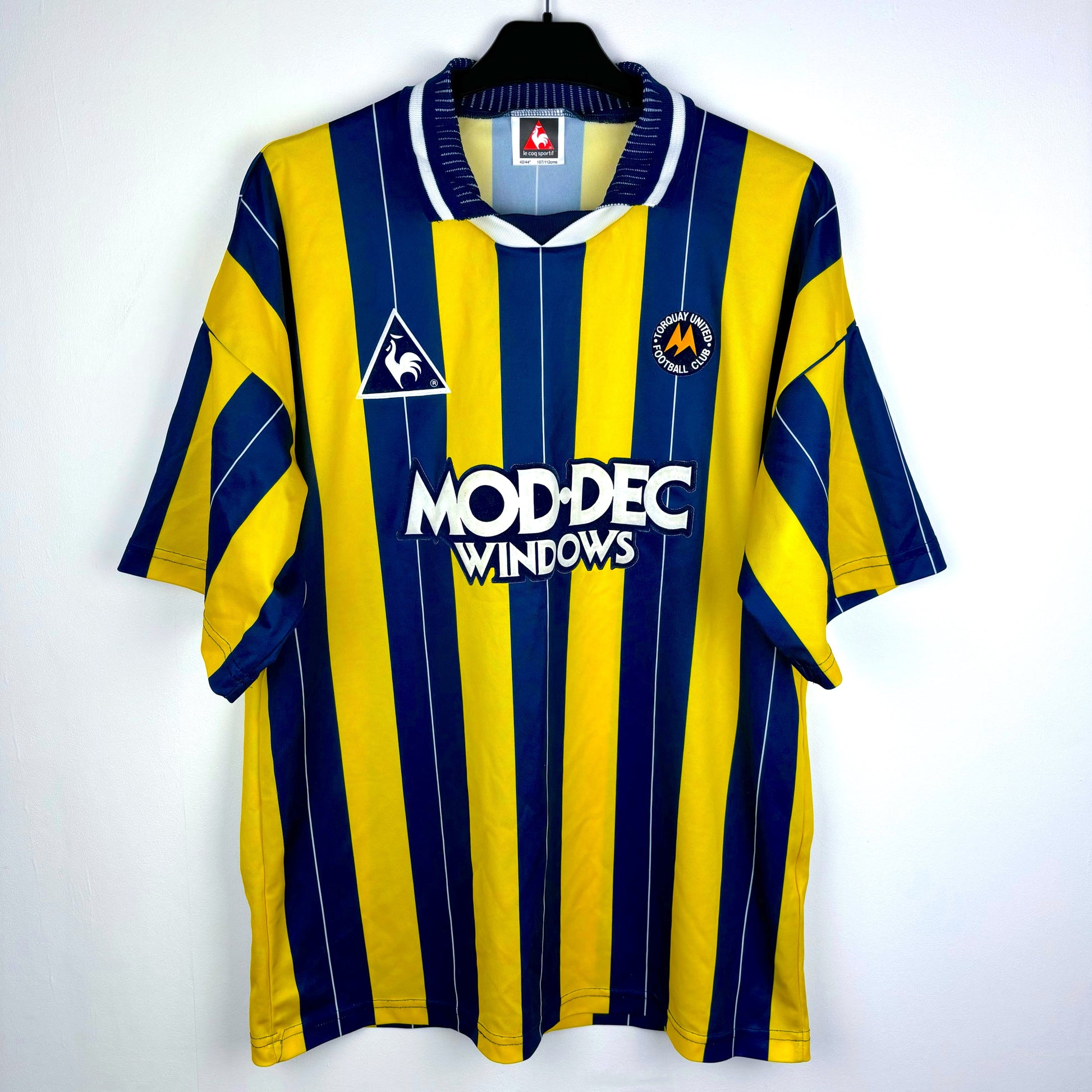 Torquay United 1995 home shirt by Le Coq Sportif – navy and yellow striped vintage football kit front